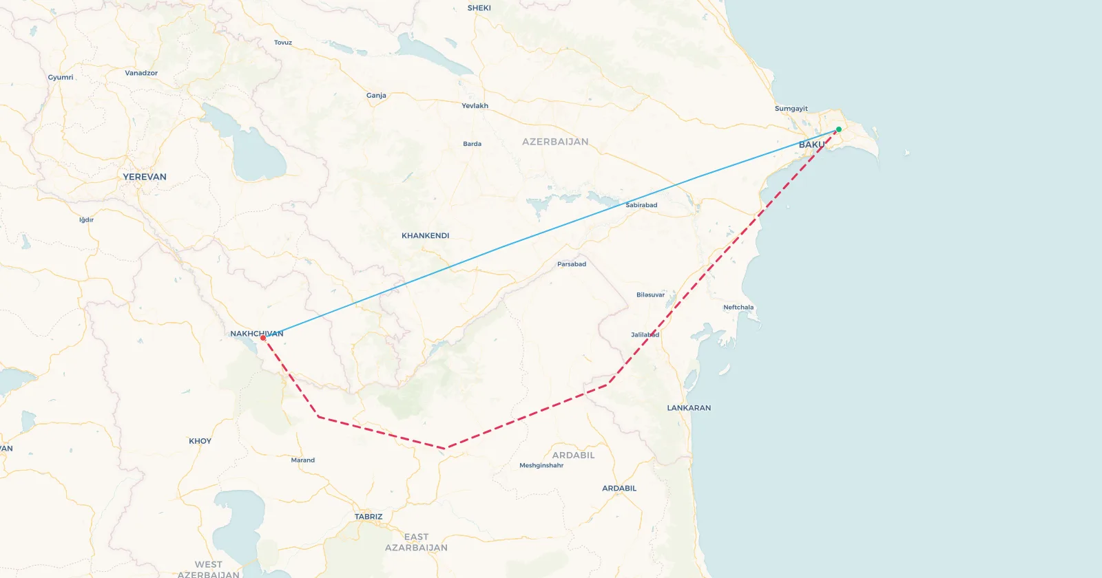 Map of the Baku to Nakhchivan flight route: the straight line across southern Armenia flown since 2021, and the dashed line showing the 2014 to 2021 routing south through Iran